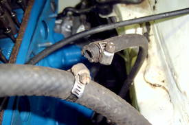Picture of a metal hose clamp on a rubber hose