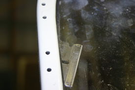 Picture of razor blade on windscreen.