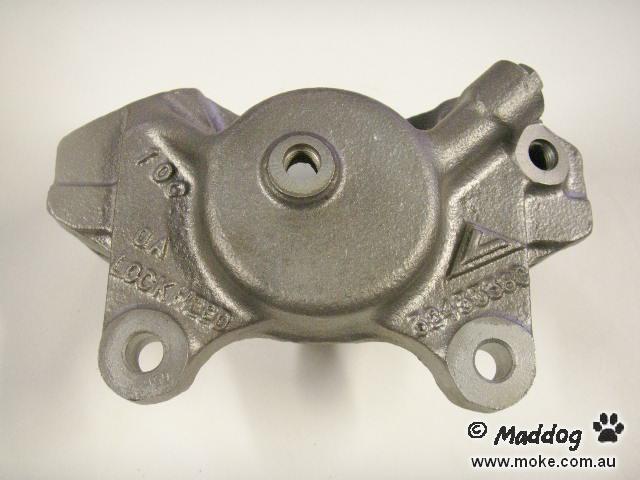 Image of a front disc brake caliper from a Moke.