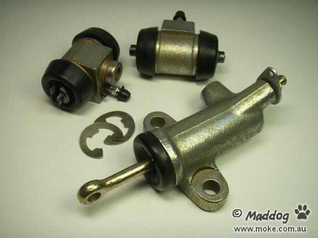 Picture of assorted brake and clutch slave cylinders from Mokes.