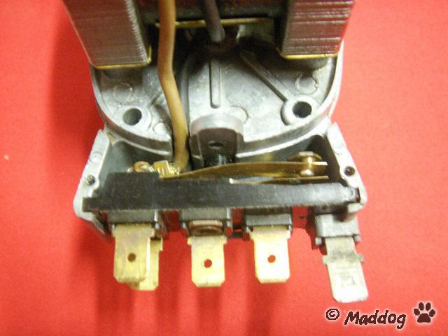 The insides and terminals of a Moke wiper motor.