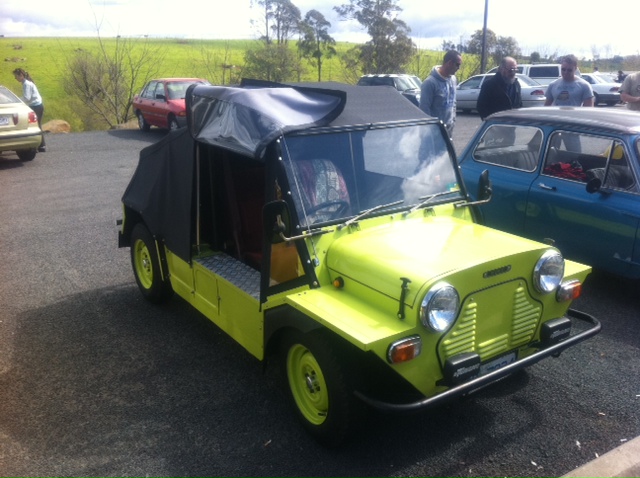 A Postie Moke painted in a lime green livery